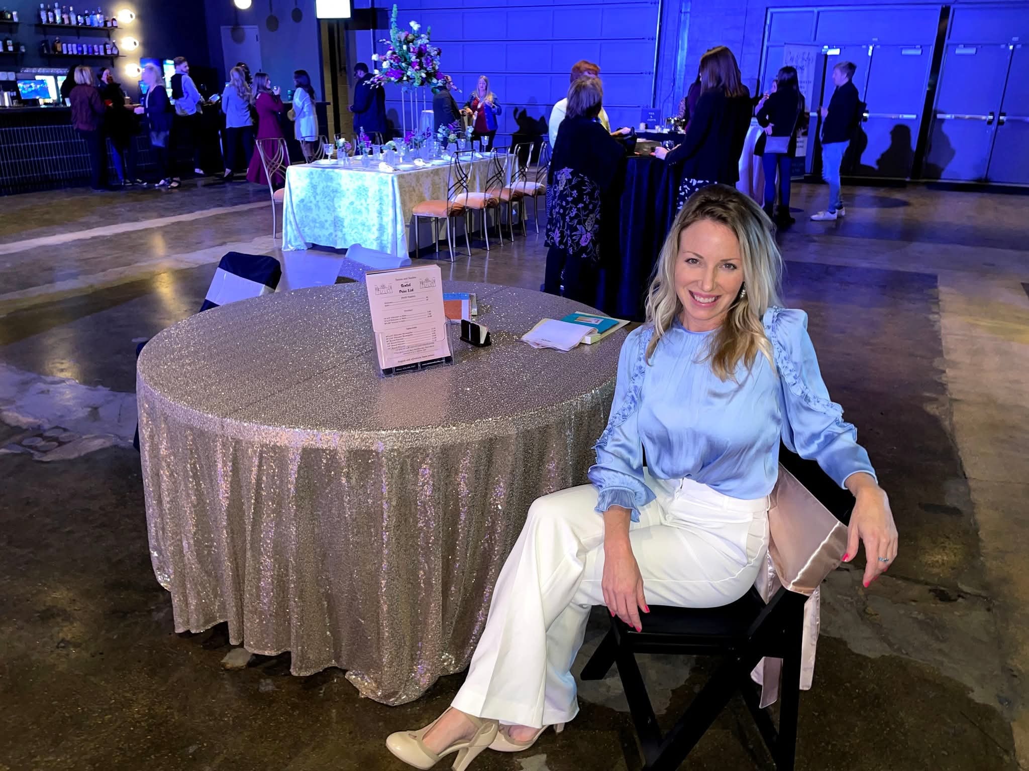 Owner at a bridal show event