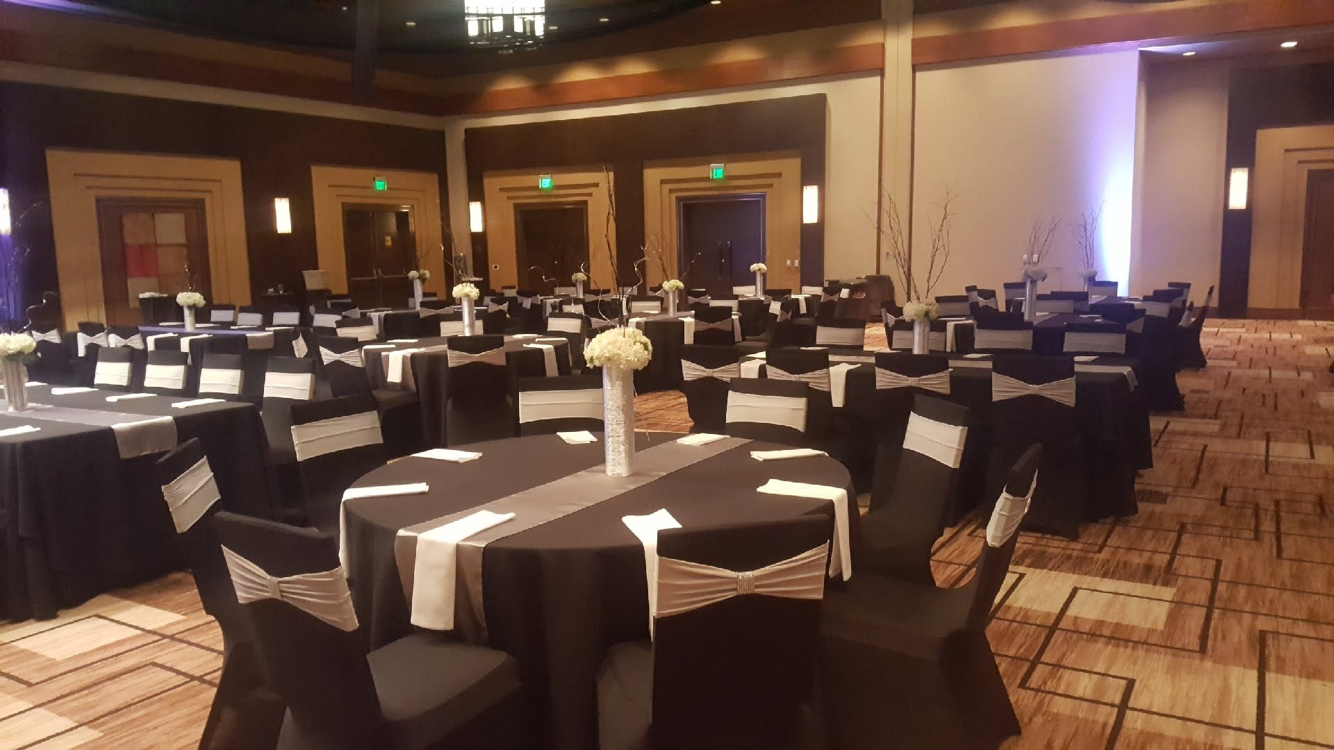 Colorful multi-hued tablecloths and draped ceiling at Ameristar