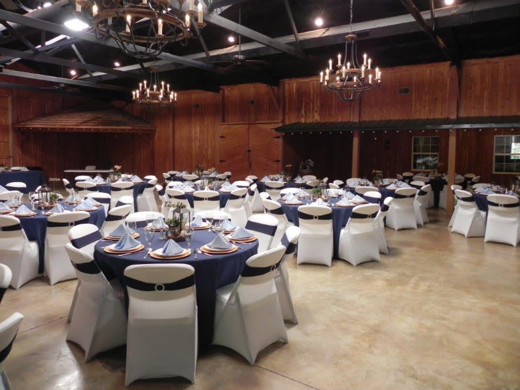 Periwinkle satin sash bow detail on white spandex chair cover