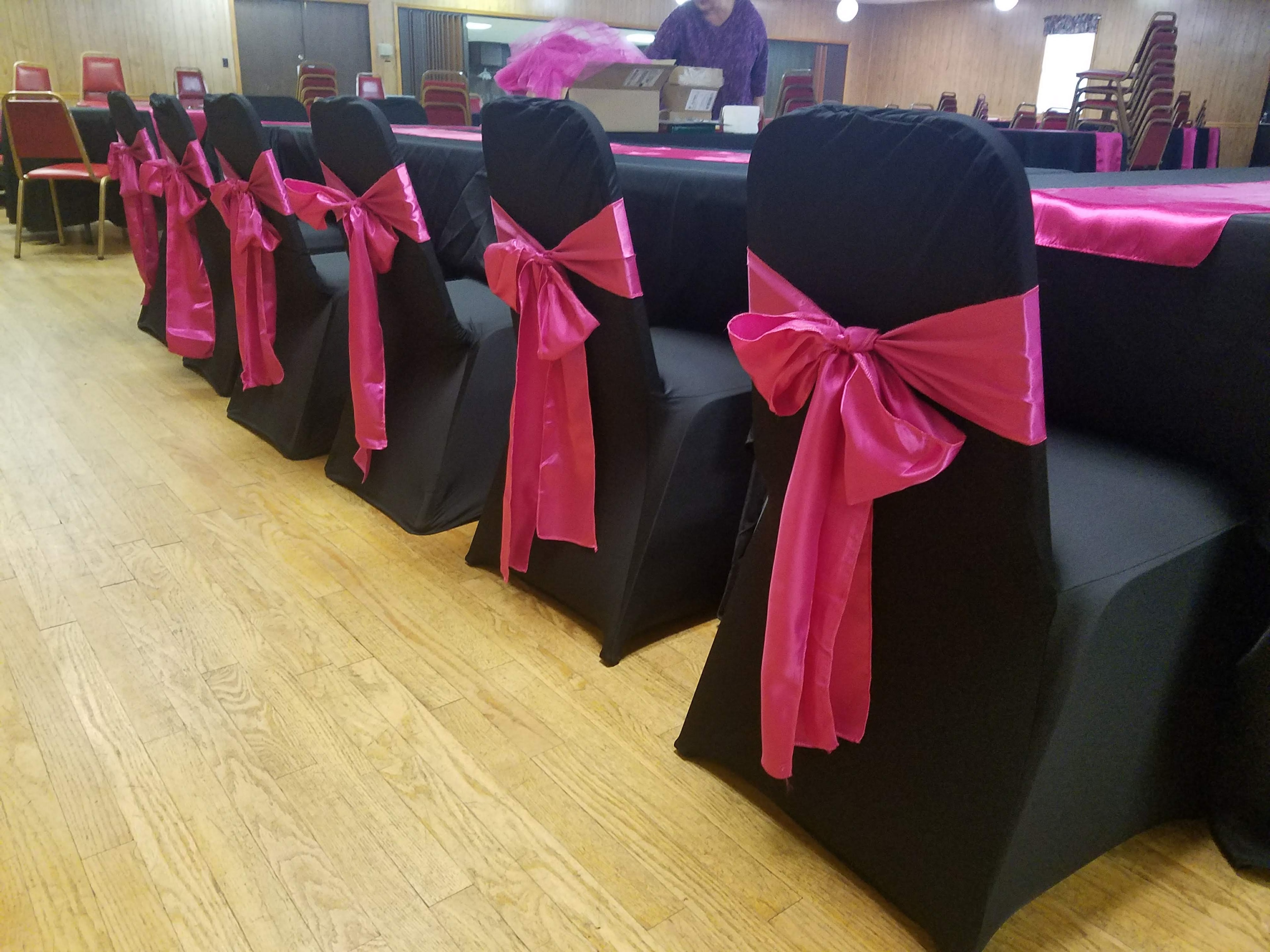 White chair cover with elegant satin bow sash